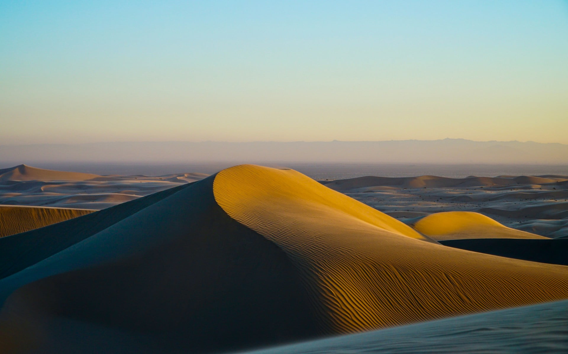 desert under blue sky during daytime